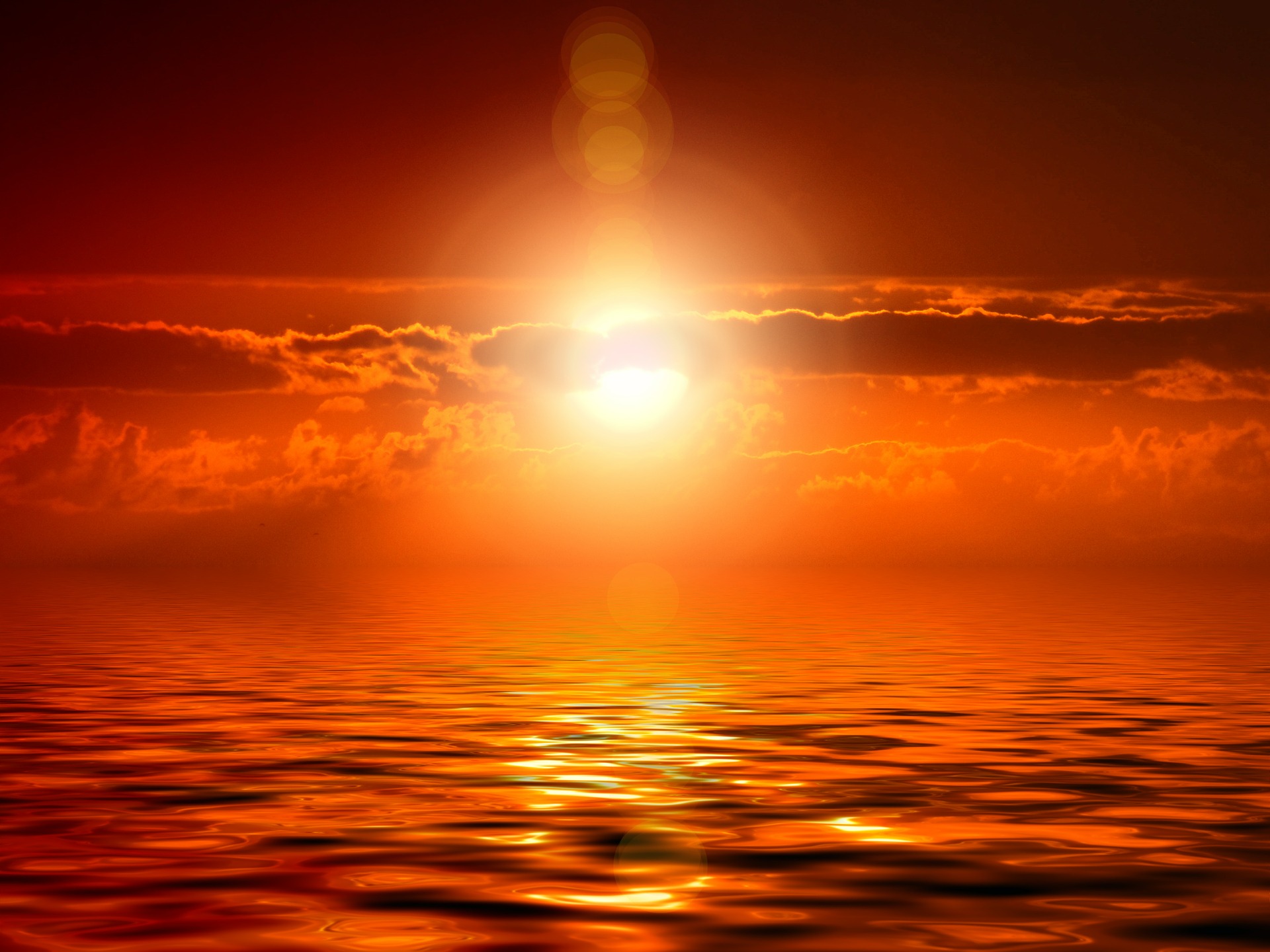 Image of sun setting over horizon